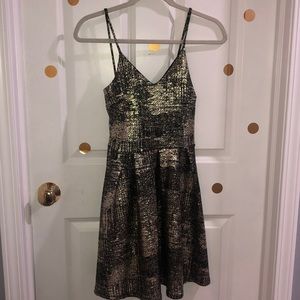 Black and gold metallic mini dress